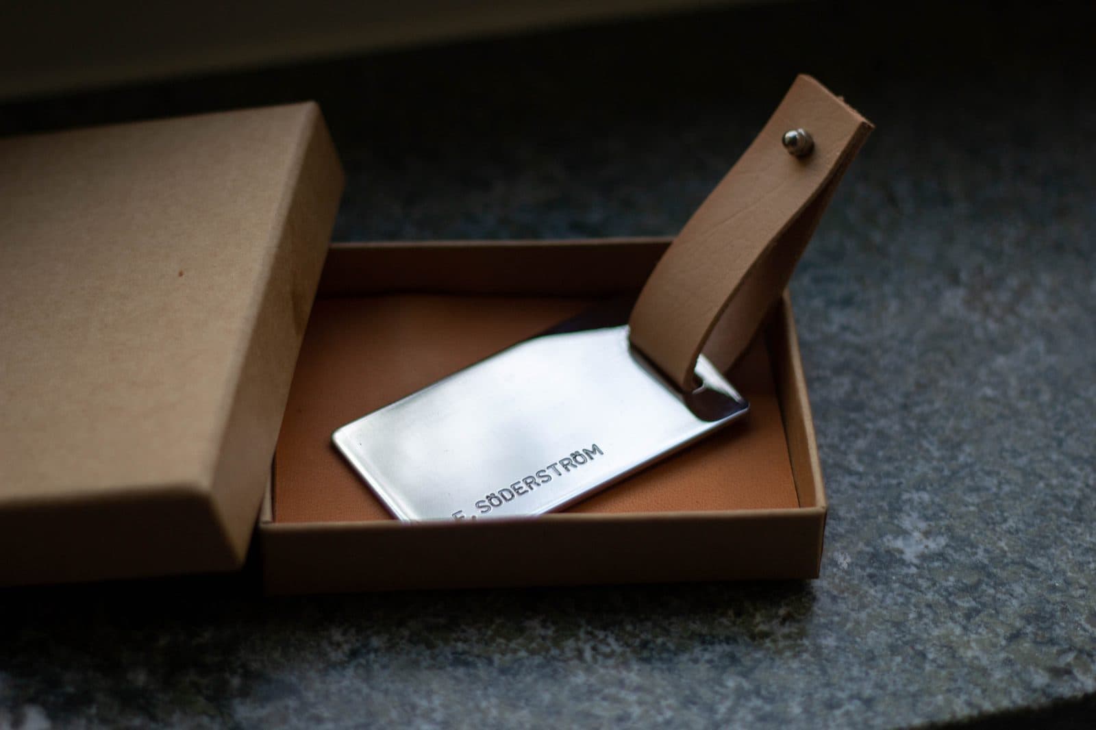Stainless steel luggage tag in leather-lined gift box