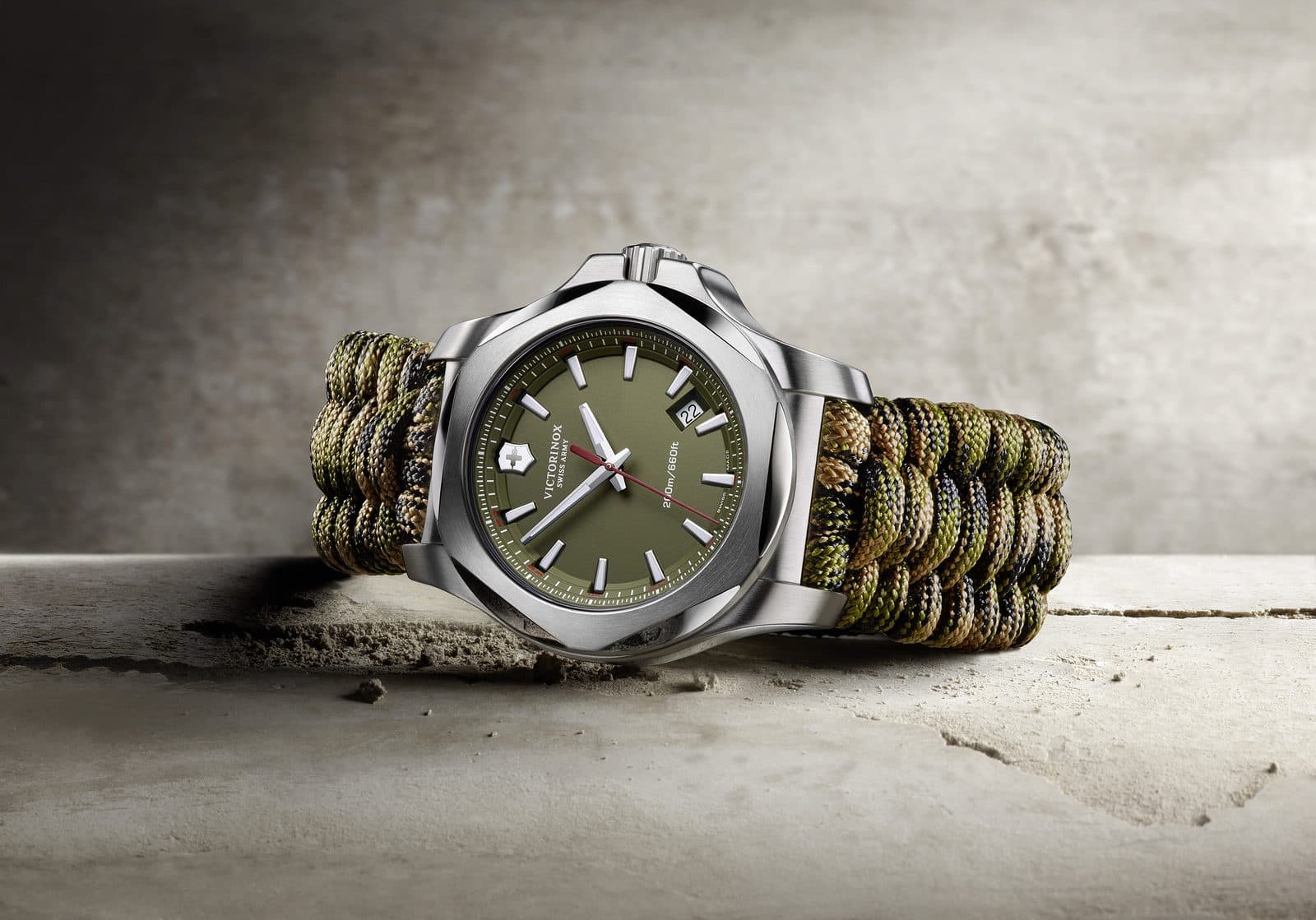 Victorinox I.N.O.X. with green camo Naimakka paracord strap — product photography